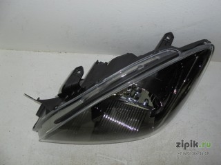 Фара механическая  черная DEPO левая  LANCER 00-10 для Mitsubishi 