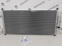 Радиатор кондиционера (с бачком осушителя) ALMERA CLASSIC 06-13